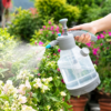 Gray Manual Pressure Garden Sprayer with Teal Nozzle
